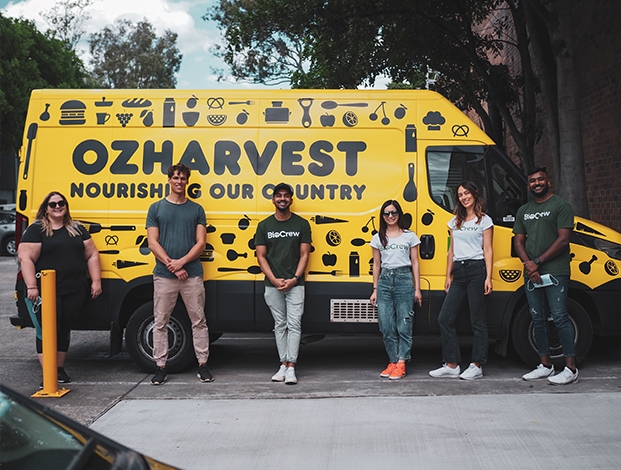 BioPak staff volunteers in front of OzHarvest Food Delivery Truck